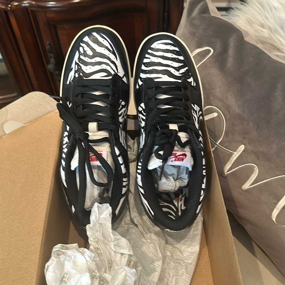 Brand new/box Nike SB Dunk Low OG sneakers. Men’s 8, women’s 9.5. Rare zebra.